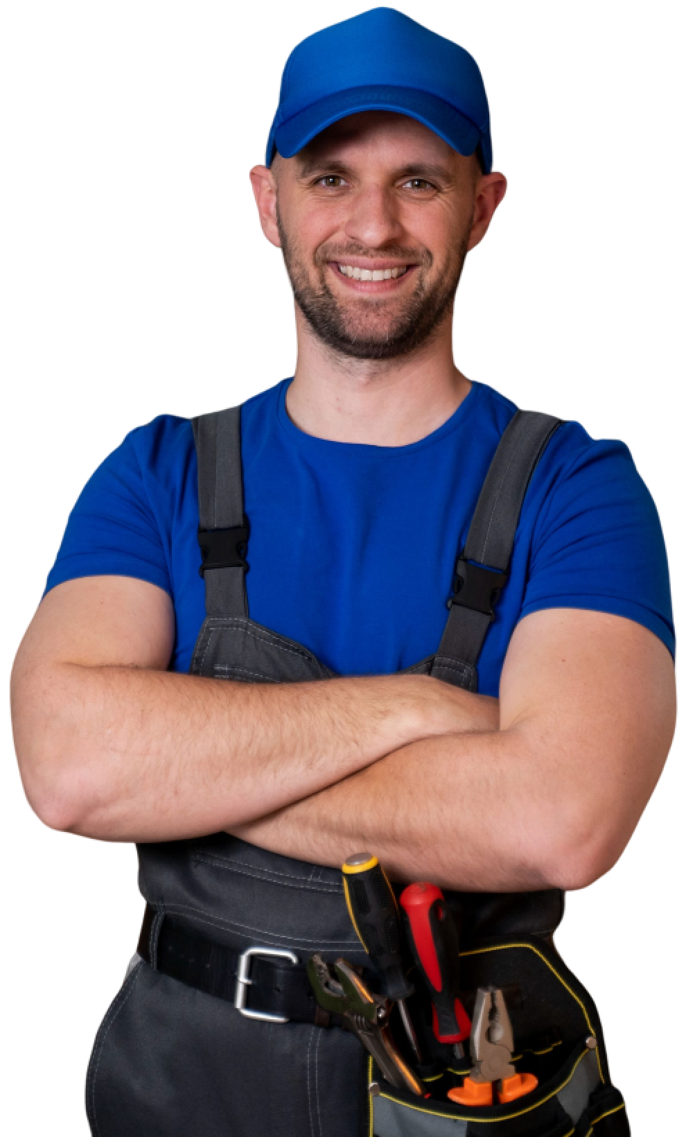 A man with his arms crossed wearing overalls.